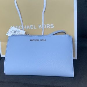Michael Kors jet set travel baby blue wristlet